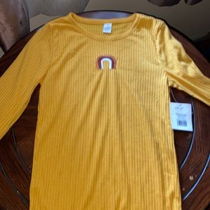 A yellow rainbow shirt